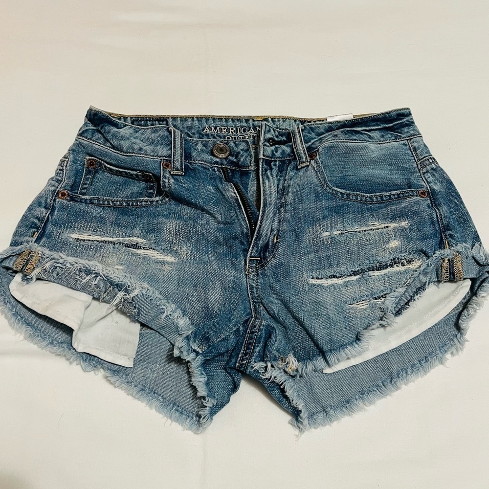American Eagle High Rise Festival Distressed Denim Shorts